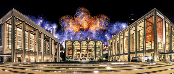 Stitched panorama of the Lincoln Center at night with fireworks